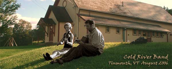 Marcos Levy and Mary Barron of Cold River Band playing for passers by in Tinmouth Vermont